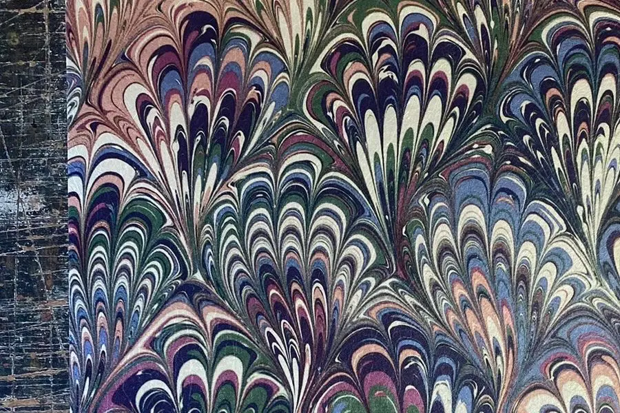 house of amity fabric and wallpaper created using marble technique