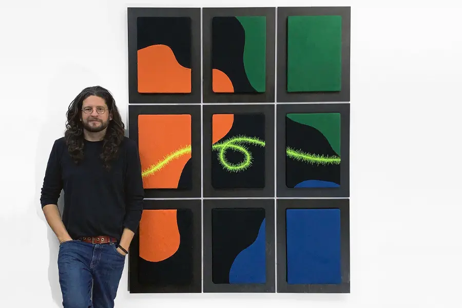 JPR Stitch artists with large scale art piece